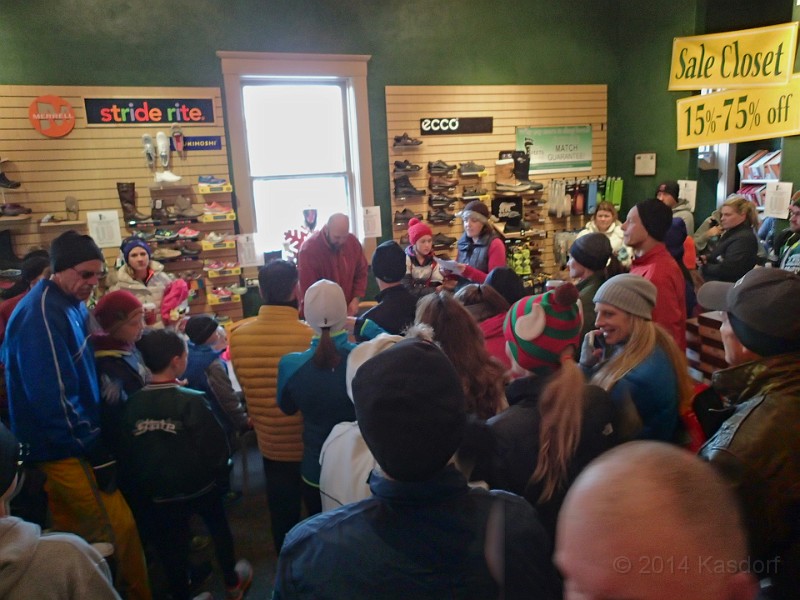 2014-11-29 2014-11 Gobbler Gallop 4Mile 026.JPG - Awards ceremony.. crowded in the small store!